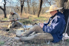 Todd Dagget cleaning gun, Brent Pollet making horse hair hat band